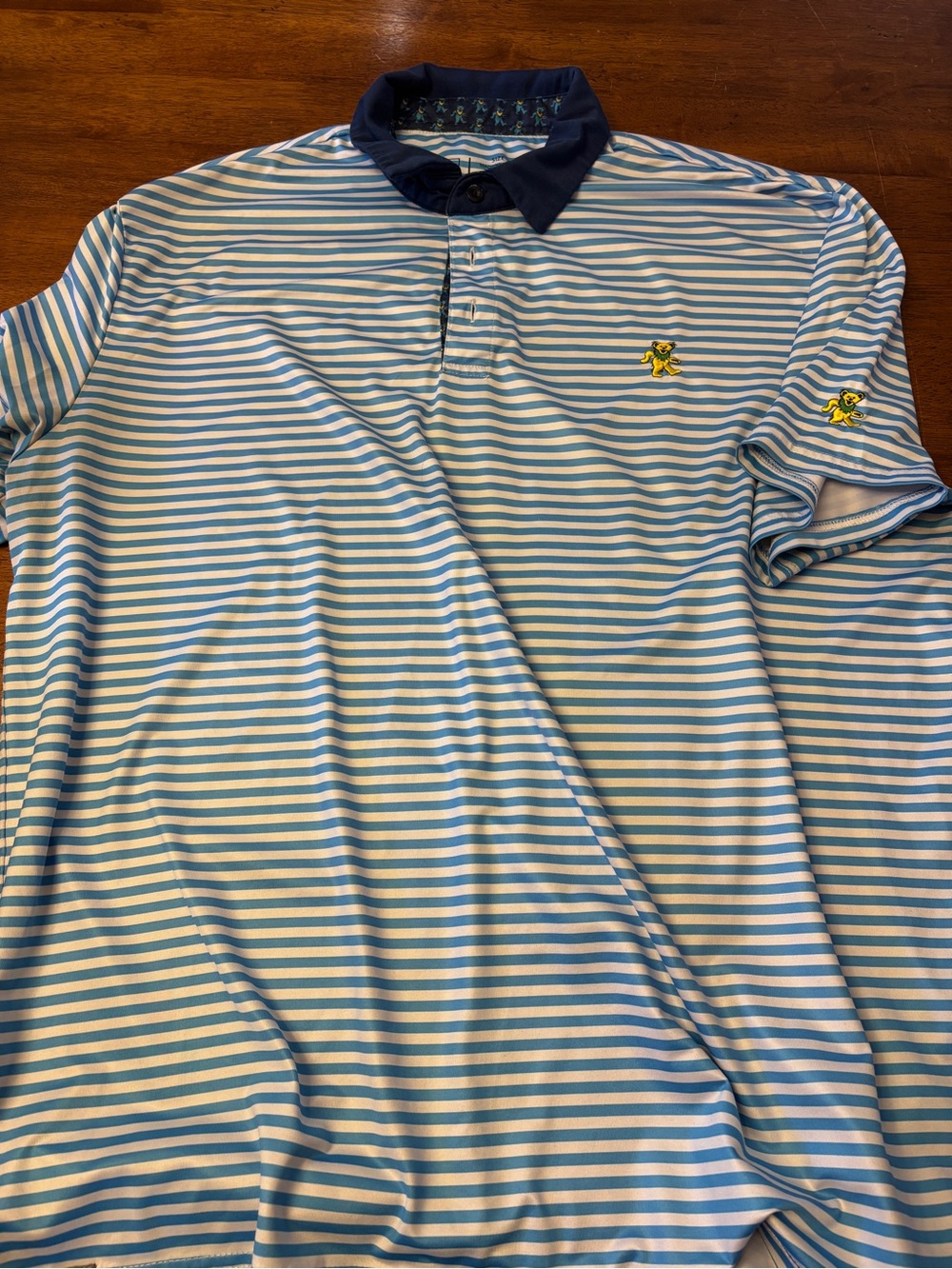 SEC 119 Grateful Dead Men's Light Blue & White Striped Polo Shirt Navy Collar